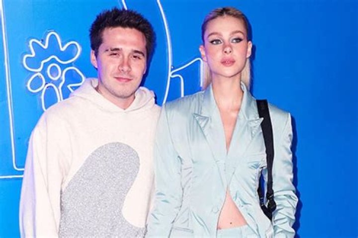 Brooklyn Beckham Kisses Nicola Peltz’s Neck On The Red Carpet At Dior Men’s Show: Photos