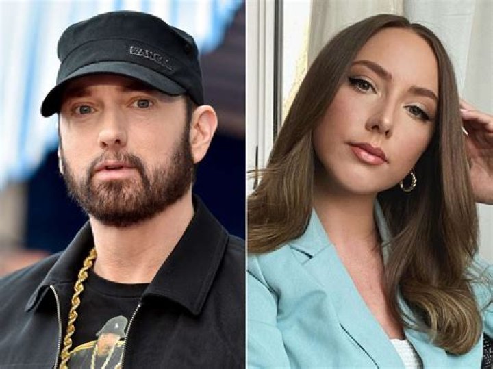 Eminem’s Daughter Hailie Rocks High-Slit Dress & Boots On Winter Vacation — Photo