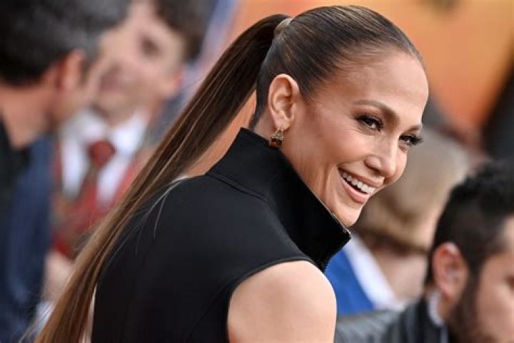 Jennifer Lopez Rocks A Slew Of Sexy Vintage Dresses In New ‘Ain’t Your Mama’ Video