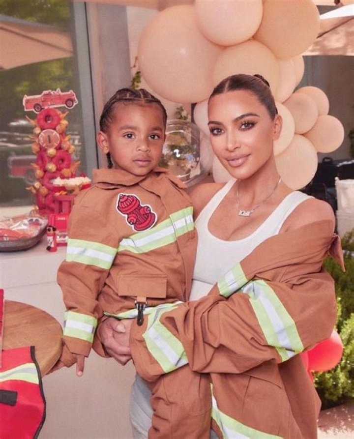 Kim Kardashian Snuggles Psalm, 2, At Kanye West’s ‘Donda’ Listening Party – Photos