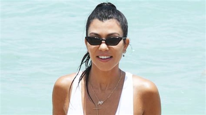 Kourtney Kardashian Rocks Gold Bikini In Never-Before-Seen Throwback Pics From Palm Springs