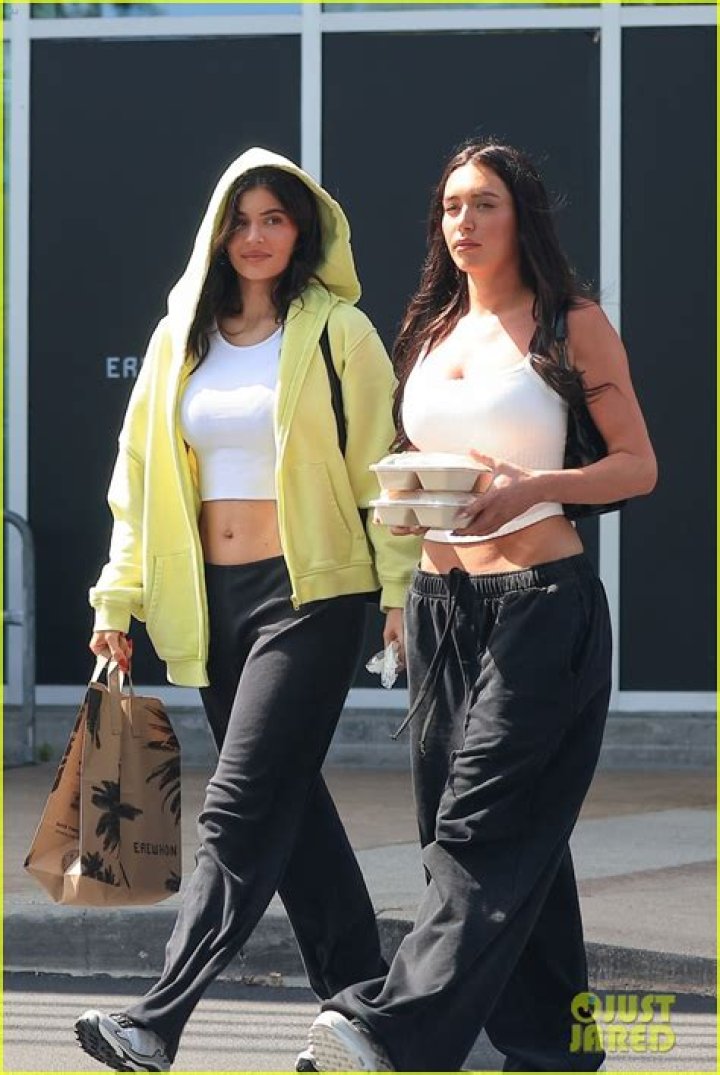Kylie Jenner & BFF Stassie Karanikolaou Look Like Twins In Matching $1740 Prada Hats & Bags