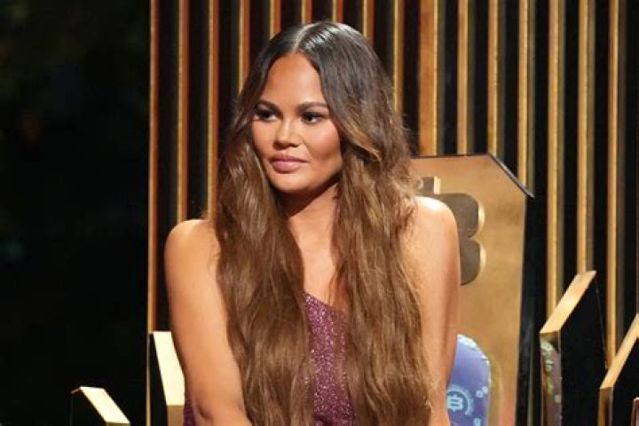 National Napping Day: 6 Stars Caught Sleeping In Weird Places: Chrissy Teigen At The Oscars & More