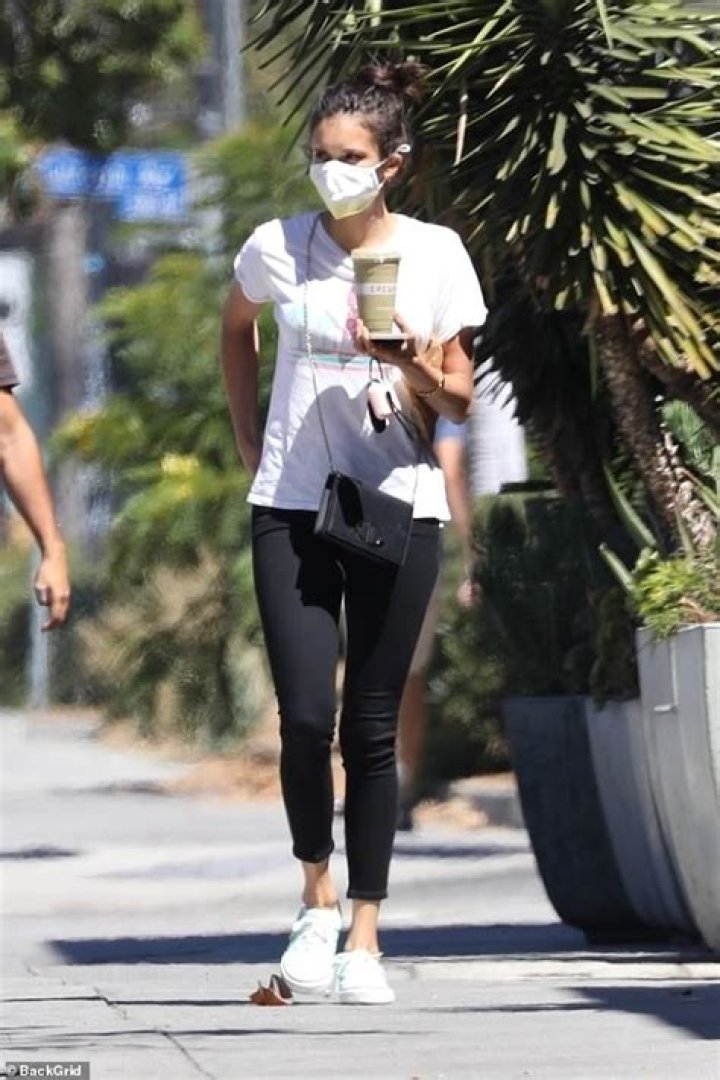 Nina Dobrev Wears See-Through Coronavirus Mask While Traveling — See Pic