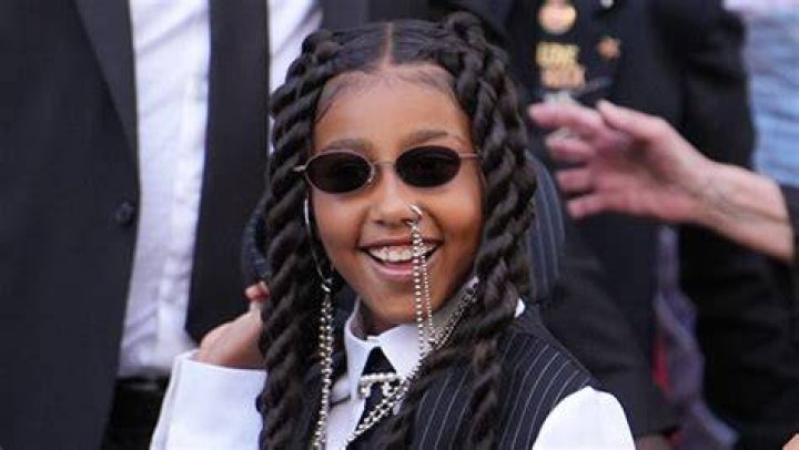 North West Completely Covers Her Face in Bright Pink Makeup in New Video