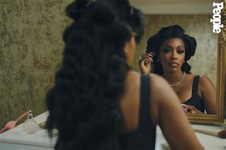 Porsha Williams Rocks A Beautiful Afro & Sexy Bodysuit As She Urges Fans To Celebrate Black Women