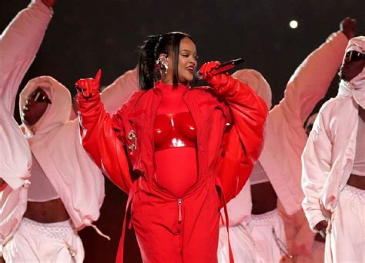Pregnant Rihanna Rocks Cropped T-Shirt & Jeans In 1st Photos After Super Bowl Performance